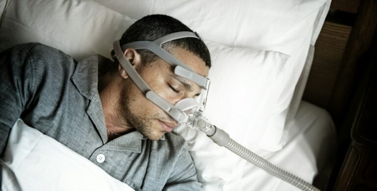 Sick man wearing an oxygen mask